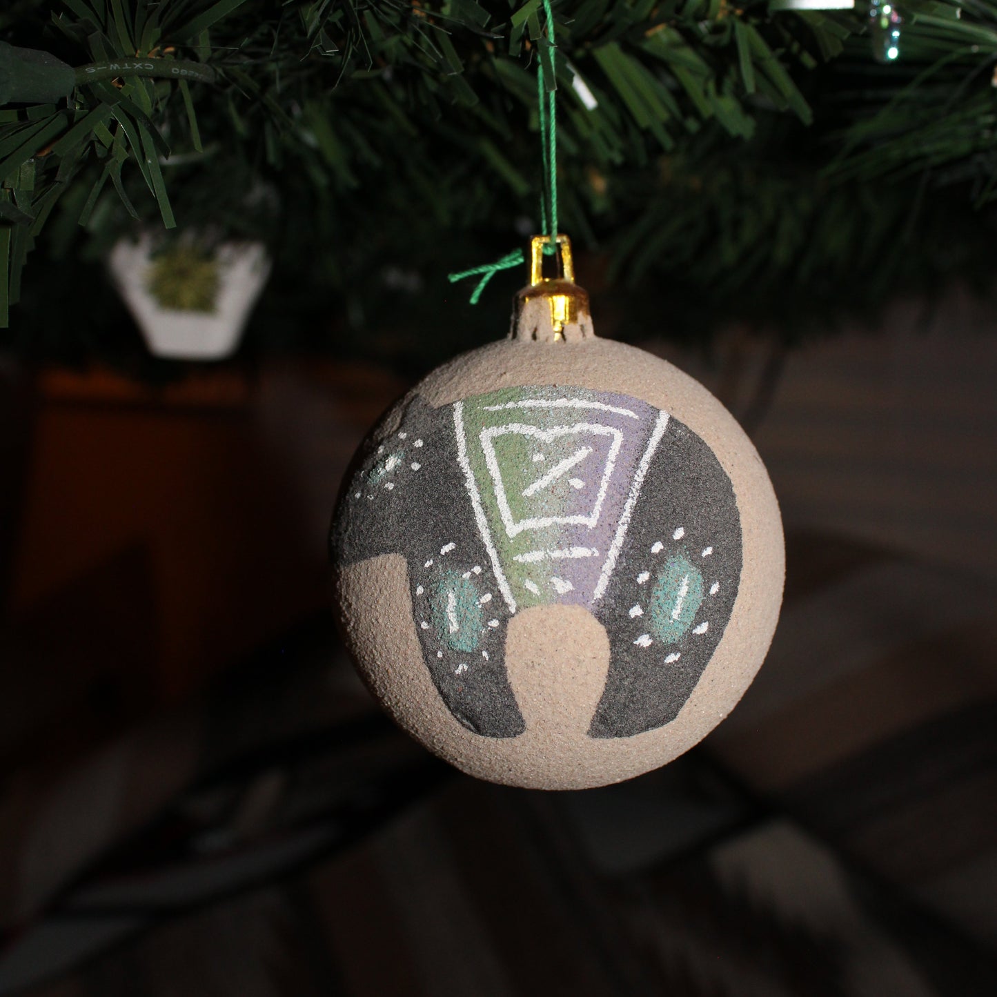 Sand painted ornament