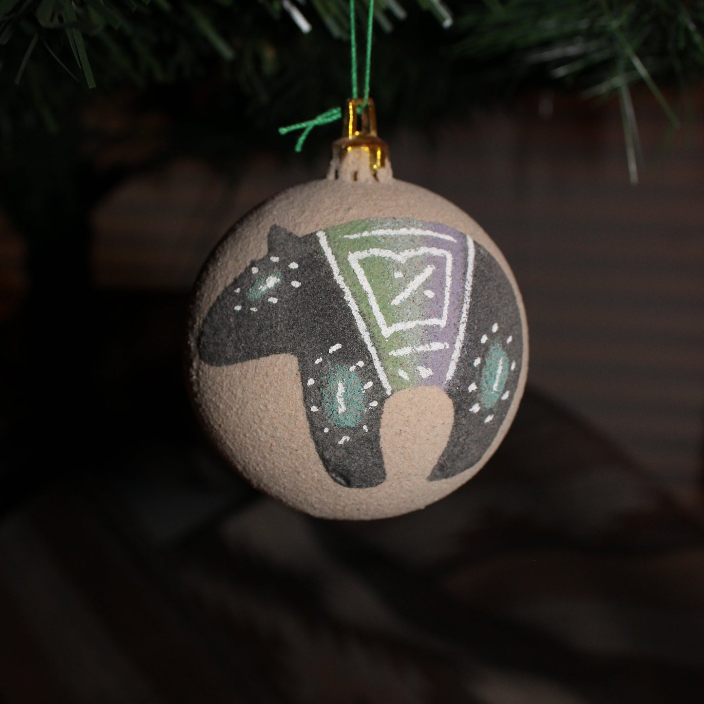Sand painted ornament