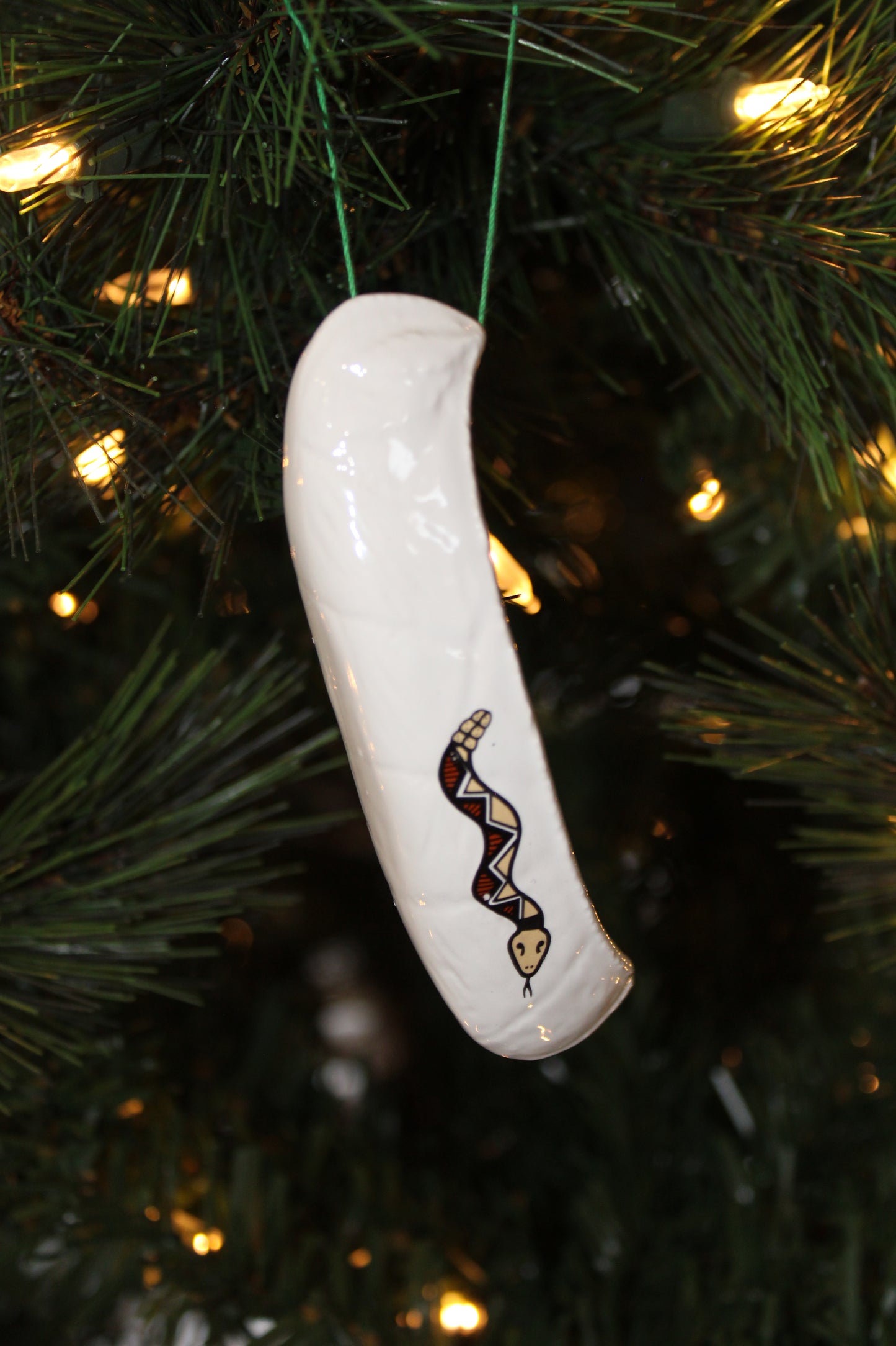 Snake Canoe Christmas Ornament